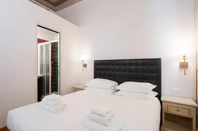 Letto o letti in una camera di Astonishing 2BR in centric in Florencia