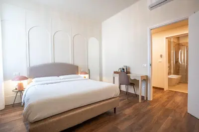 Letto o letti in una camera di Lumi Stays