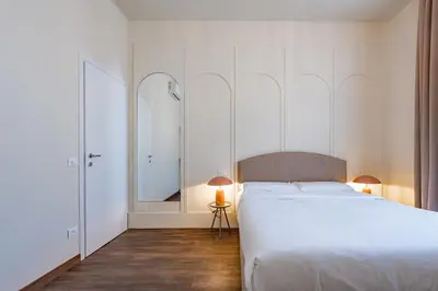 Letto o letti in una camera di Lumi Stays