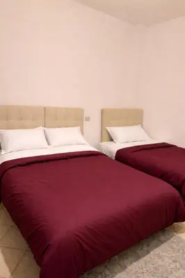 Letto o letti in una camera di Laura Apartment