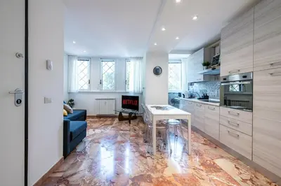 Cucina o angolo cottura di Iris Apartment with Jacuzzi - Easy City Access