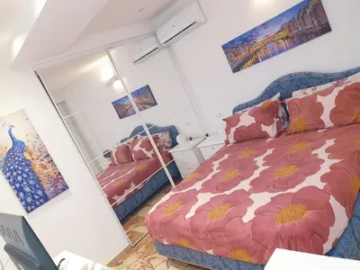 Letto o letti in una camera di Iris Apartment with Jacuzzi - Easy City Access