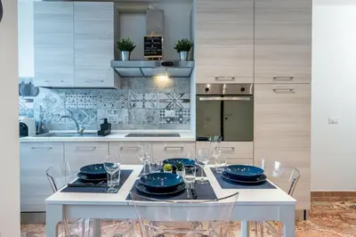 Cucina o angolo cottura di Iris Apartment with Jacuzzi - Easy City Access