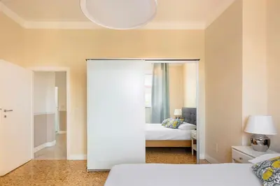 Letto o letti in una camera di Attico Monteverdi