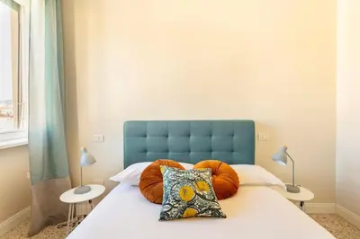 Letto o letti in una camera di Attico Monteverdi