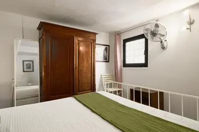 Letto o letti in una camera di La Dimora delle Belle Arti e del Silenzio
