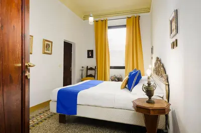 Letto o letti in una camera di La Dimora delle Belle Arti e del Silenzio