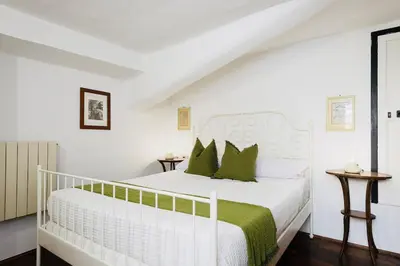 Letto o letti in una camera di La Dimora delle Belle Arti e del Silenzio