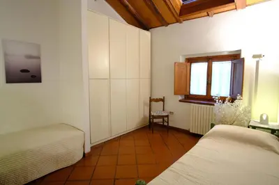 Letto o letti in una camera di apartment monte, relax in the hills of Florence