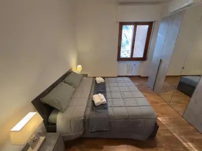Letto o letti in una camera di Harmony Home in Florence