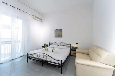 Letto o letti in una camera di UNYCA - San Domenico Florence Apartment