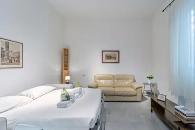 Letto o letti in una camera di UNYCA - San Domenico Florence Apartment