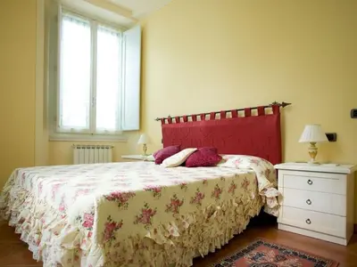 Letto o letti in una camera di Apartment Wohnung 'San Firenze' mit Waschmaschine by Interhome