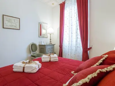 Letto o letti in una camera di Apartment Ruhige Wohnung in Santa Croce mit Terrasse- Kathedrale von Florenz-Nähe by Interhome