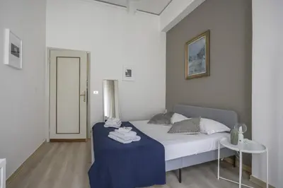 Letto o letti in una camera di Family Apartment in the Heart of Florence