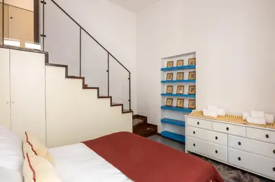 Letto o letti in una camera di Like a Local Borgo San Jacopo By Maison Florence