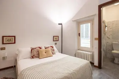 Letto o letti in una camera di Like a Local Borgo San Jacopo By Maison Florence