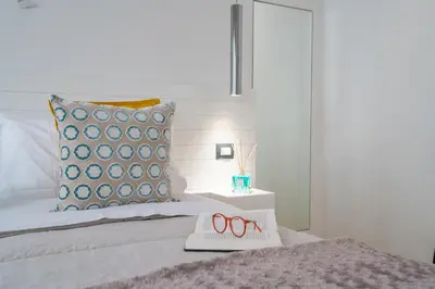 Letto o letti in una camera di Dépendance Machiavelli - Apartment and Wine
