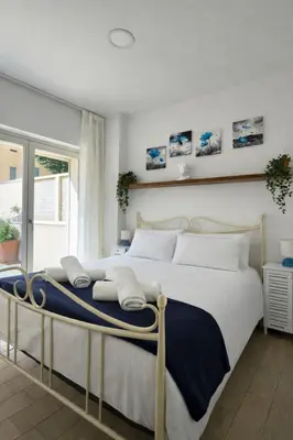 Letto o letti in una camera di DolcevitaFirenze - Wi-fi, TV, River, 15 mins from Centre