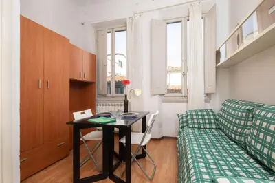 Letto o letti in una camera di Ognissanti Essential Studio Apartment