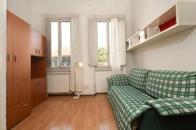 Area soggiorno di Ognissanti Essential Studio Apartment