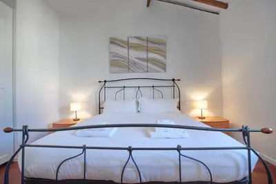 Letto o letti in una camera di Torta-walking distance of Santa Croce
