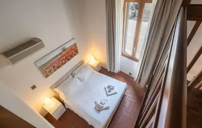 Letto o letti in una camera di Cute One Bedroom Apartment in Florence Outside ZTL