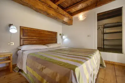Letto o letti in una camera di Piazza Goldoni Studio Apartment