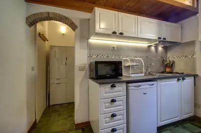 Cucina o angolo cottura di Piazza Goldoni Studio Apartment