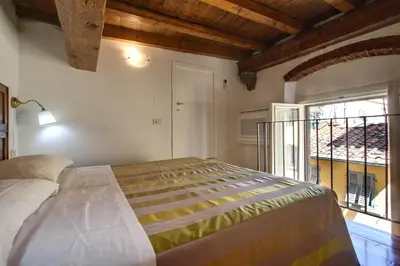 Letto o letti in una camera di Piazza Goldoni Studio Apartment