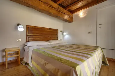 Letto o letti in una camera di Piazza Goldoni Studio Apartment