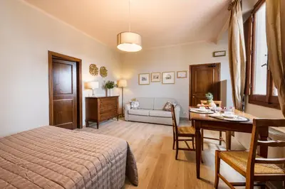 Letto o letti in una camera di Apartments FLorence - Ariento Perseo