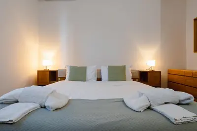 Letto o letti in una camera di Aurora Urban Nest