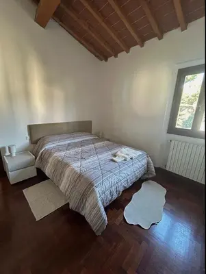 Letto o letti in una camera di Comfort e quiete vicino al cuore di Firenze