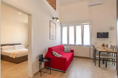 Letto o letti in una camera di ViviLafirenze G