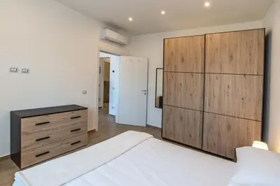 Letto o letti in una camera di ViviLafirenze G