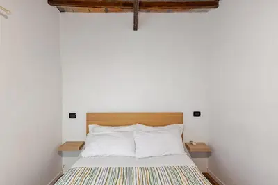 Letto o letti in una camera di Palazzuolo Apartment