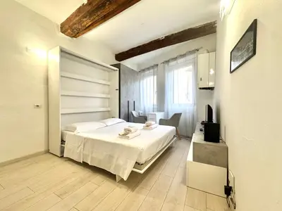 Letto o letti in una camera di Mono Romana