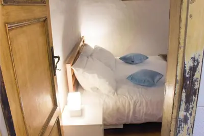 Letto o letti in una camera di Industrial House - S. Niccolò Arno