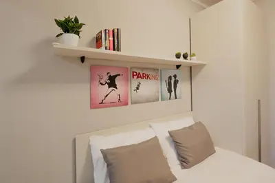 Letto o letti in una camera di Guest House Lippi 35 in centro a 19 Minuti da Firenze