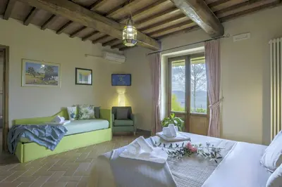 Letto o letti in una camera di Medieval Church With Pool In Chianti