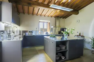 Cucina o angolo cottura di Medieval Church With Pool In Chianti