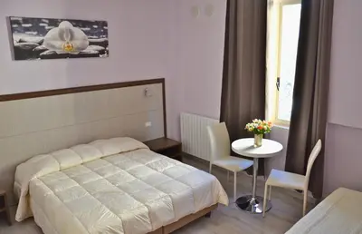 Letto o letti in una camera di Florence Stadium B&B