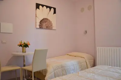 Letto o letti in una camera di Florence Stadium B&B