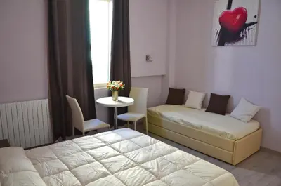 Letto o letti in una camera di Florence Stadium B&B