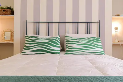 Letto o letti in una camera di Appartamento Bixio