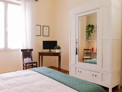 Letto o letti in una camera di Appartamento Bixio