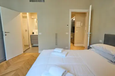 Letto o letti in una camera di Modern Penthouse with Terrace San Frediano
