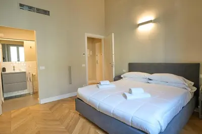 Letto o letti in una camera di Modern Penthouse with Terrace San Frediano
