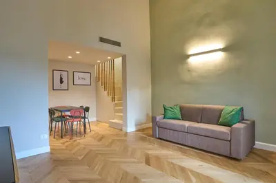 Area soggiorno di Modern Penthouse with Terrace San Frediano